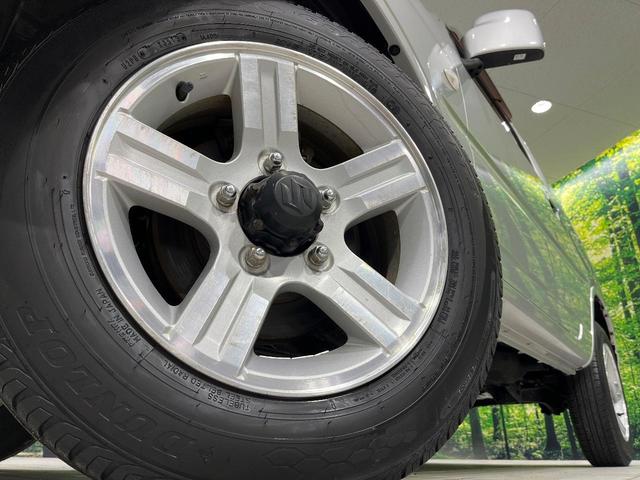 ジムニー ＸＣ　４ＷＤ　禁煙車　キーレス　ルーフレール　ＣＤオーディオ　ＡＢＳ　エアコン　電動格納ミラー　純正１６インチアルミホイール　衝突安全ボディ　盗難防止システム　パワーウィンドウ　プライバシーガラス（13枚目）