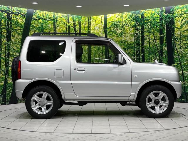 ジムニー ＸＣ　４ＷＤ　禁煙車　キーレス　ルーフレール　ＣＤオーディオ　ＡＢＳ　エアコン　電動格納ミラー　純正１６インチアルミホイール　衝突安全ボディ　盗難防止システム　パワーウィンドウ　プライバシーガラス（26枚目）