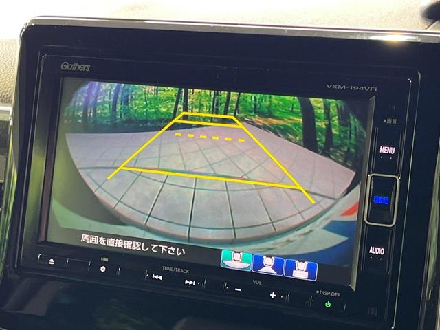 N-BOXカスタム G・Lターボホンダセンシング 4WD ターボ 両側電動スライドドア 純正SDナビ バックカメラ ホンダセンシング アダプティブクルーズ 禁煙車 シートヒーター 前後ドラレコ レーンキープ スマートキー LEDヘッド ETC(5枚目)