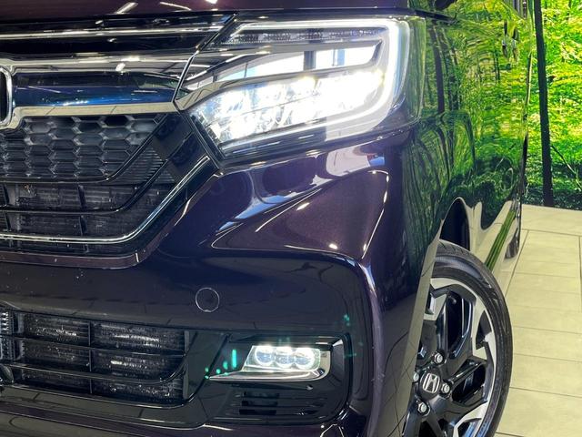 N-BOXカスタム G・Lターボホンダセンシング 4WD ターボ 両側電動スライドドア 純正SDナビ バックカメラ ホンダセンシング アダプティブクルーズ 禁煙車 シートヒーター 前後ドラレコ レーンキープ スマートキー LEDヘッド ETC(12枚目)