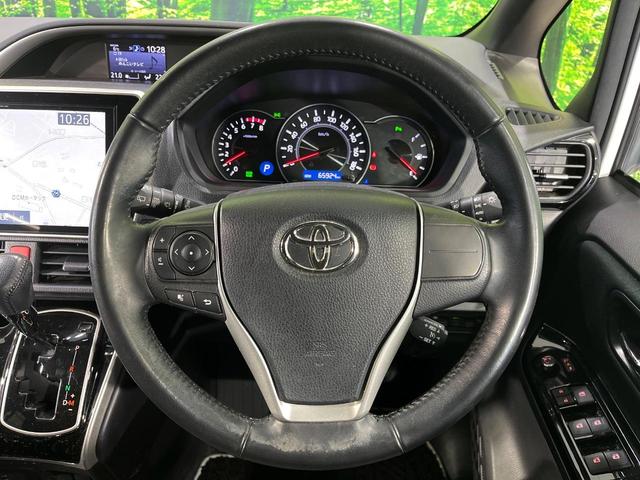 ヴォクシー ＺＳ　煌ＩＩ　４ＷＤ　両側電動スライドドア　純正１０型ＳＤナビ　フリップダウンモニター　バックカメラ　寒冷地仕様　セーフティセンスＣ　禁煙車　ドラレコ　コーナーセンサー　スマートキー　ＬＥＤヘッド　ＥＴＣ（12枚目）