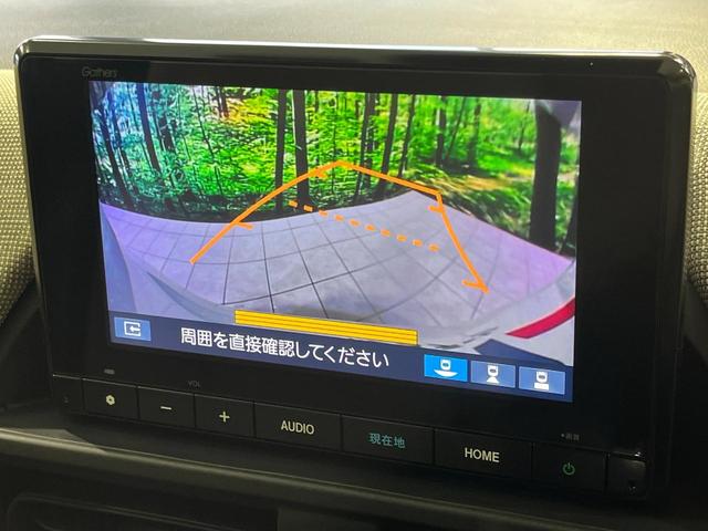 フリード エアー 4WD 両側電動スライドドア 8型純正ナビ バックカメラ 寒冷地仕様 ホンダセンシング アダプティブクルーズ 禁煙車 前席シートヒーター ドラレコ コーナーセンサー スマートキー LEDヘッド ETC(5枚目)