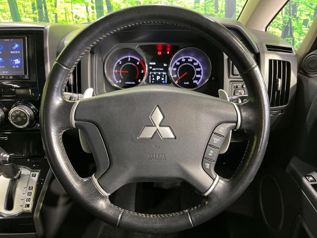 デリカＤ：５ Ｄ　パワーパッケージ　４ＷＤ　ターボ　両側電動スライドドア　ＳＤナビ　バックカメラ　禁煙車　前席シートヒーター　スマートキー　ＨＩＤヘッド　ビルトインＥＴＣ　オートライト　オートエアコン　純正１８インチＡＷ（12枚目）