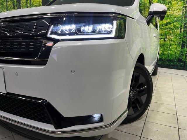 ステップワゴン スパーダ　４ＷＤ　両側電動スライド　ＳＤナビ　バックカメラ　寒冷地仕様　ホンダセンシング　禁煙車　パワーバックドア　合皮シート　前席シートヒーター　ドラレコ　コーナーセンサー　スマートキー　ＬＥＤヘッド　ＥＴＣ（13枚目）