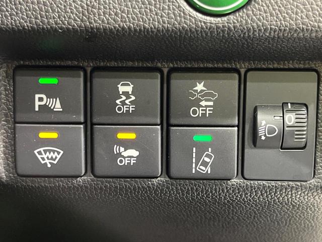 フィットハイブリッド Ｆ　４ＷＤ　ＳＤナビ　バックカメラ　寒冷地仕様　アダプティブクルーズコントロール　ホンダセンシング　禁煙車　コーナーセンサー　スマートキー　ＥＴＣ　オートエアコン　ＣＤ　ＤＶＤ再生（5枚目）