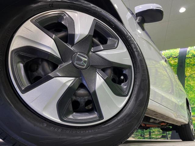 フィットハイブリッド Ｆ　４ＷＤ　ＳＤナビ　バックカメラ　寒冷地仕様　アダプティブクルーズコントロール　ホンダセンシング　禁煙車　コーナーセンサー　スマートキー　ＥＴＣ　オートエアコン　ＣＤ　ＤＶＤ再生（13枚目）