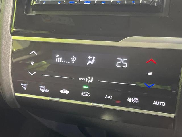 フィットハイブリッド Ｆ　４ＷＤ　ＳＤナビ　バックカメラ　寒冷地仕様　アダプティブクルーズコントロール　ホンダセンシング　禁煙車　コーナーセンサー　スマートキー　ＥＴＣ　オートエアコン　ＣＤ　ＤＶＤ再生（31枚目）