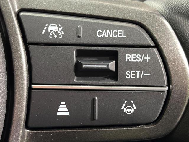 フリード ｅ：ＨＥＶクロスター　４ＷＤ　登録済未使用車　両側電動スライド　ホンダセンシング　アダプティブクルーズ　ハーフレザーシート　クリアランスソナー　スマートキー　ＬＥＤヘッド　純正１５インチＡＷ　オートハイビーム　オートライト（6枚目）