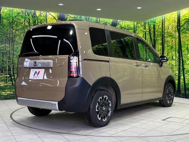 フリード ｅ：ＨＥＶクロスター　４ＷＤ　登録済未使用車　両側電動スライド　ホンダセンシング　アダプティブクルーズ　ハーフレザーシート　クリアランスソナー　スマートキー　ＬＥＤヘッド　純正１５インチＡＷ　オートハイビーム　オートライト（18枚目）