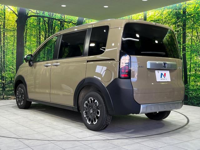 フリード ｅ：ＨＥＶクロスター　４ＷＤ　登録済未使用車　両側電動スライド　ホンダセンシング　アダプティブクルーズ　ハーフレザーシート　クリアランスソナー　スマートキー　ＬＥＤヘッド　純正１５インチＡＷ　オートハイビーム　オートライト（27枚目）