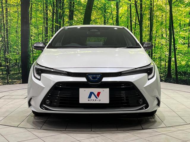 カローラツーリング ハイブリッド ダブルバイビー 4WD 純正10.5型ナビ バックカメラ セーフティセンス レーダークルーズ AC100V電源 禁煙車 ハーフレザーシート コーナーセンサー LEDヘッド ETC2.0 純正17インチAW(14枚目)