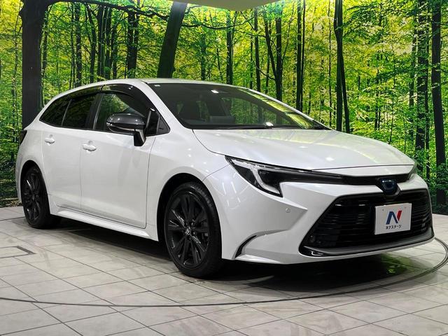 カローラツーリング ハイブリッド ダブルバイビー 4WD 純正10.5型ナビ バックカメラ セーフティセンス レーダークルーズ AC100V電源 禁煙車 ハーフレザーシート コーナーセンサー LEDヘッド ETC2.0 純正17インチAW(16枚目)
