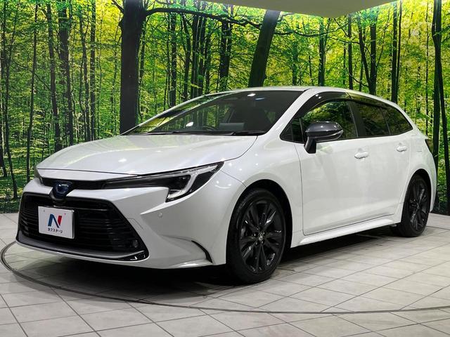 カローラツーリング ハイブリッド ダブルバイビー 4WD 純正10.5型ナビ バックカメラ セーフティセンス レーダークルーズ AC100V電源 禁煙車 ハーフレザーシート コーナーセンサー LEDヘッド ETC2.0 純正17インチAW(42枚目)