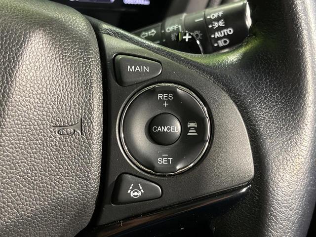 ヴェゼル ハイブリッドＸ・ホンダセンシング　４ＷＤ　純正８型ナビ　バックカメラ　ホンダセンシング　アダプティブクルーズ　禁煙車　前席シートヒーター　スマートキー　ＬＥＤヘッド　ＥＴＣ　オートハイビーム　車線逸脱警報　誤発進抑制機能　オートライト（6枚目）