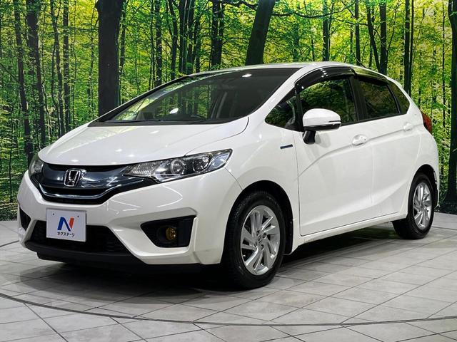 フィットハイブリッド Ｌパッケージ　純正ナビ　バックカメラ　寒冷地仕様　シティブレーキアクティブシステム　禁煙車　ドラレコ　スマートキー　ＬＥＤヘッド　ＥＴＣ　純正１５インチアルミ　オートライト　オートエアコン　Ｂｌｕｅｔｏｏｔｈ（42枚目）