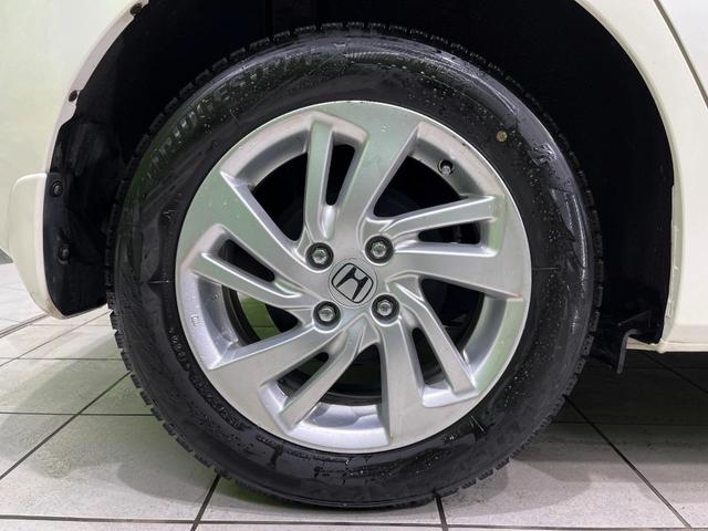 フィットハイブリッド Ｌパッケージ　純正ナビ　バックカメラ　寒冷地仕様　シティブレーキアクティブシステム　禁煙車　ドラレコ　スマートキー　ＬＥＤヘッド　ＥＴＣ　純正１５インチアルミ　オートライト　オートエアコン　Ｂｌｕｅｔｏｏｔｈ（61枚目）