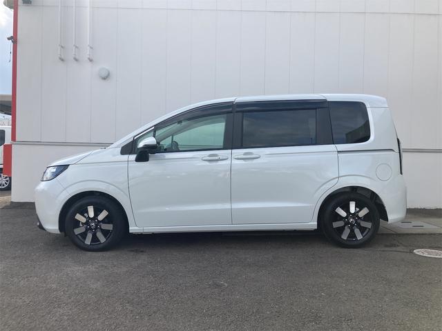 フリード エアー　ＥＸ　禁煙車　９インチナビＴＶＢカメラ　ホンダセンシング　レーダークルーズ・レーンキープ　リアクーラー　ＢＳＩ　シートヒーター　両側ＰＷスライド　クリアランスソナー　ＥＴＣ　ＵＳＢ　ＨＤＭＩ　ＬＥＤライト（15枚目）