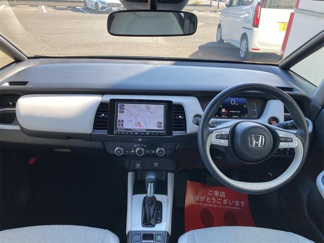 フィット e:HEVホーム ホンダセンシング 禁煙1オーナー レーダークルーズ レーンキープ 8インチ純正ナビTVBカメラ Blutooth プレミアムライトグレーインテリア LEDオートハイビーム USB パーキングセンサー(2枚目)