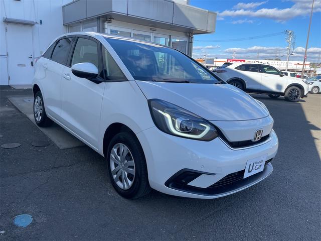 フィット ｅ：ＨＥＶホーム　４ＷＤ　ホンダセンシング　レーンキープ　レーダークルーズ　ナビＢｌｕｔｏｏｔｈバックカメラ　ＬＥＤオートハイビーム　ドラレコ　パーキングセンサー　スマートキー２個　サイドエアバック　ＵＳＢ　ＥＴＣ（12枚目）