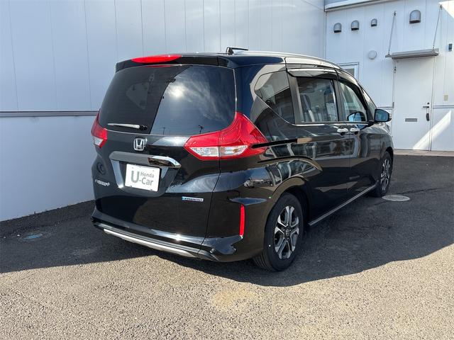 フリード＋ハイブリッド ハイブリッド・クロスター　ホンダセンシング　レーダークルーズ　レーンキープ　純正９インチナビＴＶＢカメラ　Ｂｌｕｔｏｏｔｈ　前後ドラレコ　ルーフレール　シートヒーター　ＬＥＤオートライト　ＥＴＣ　ＵＳＢ　両側ＰＷスライド（17枚目）