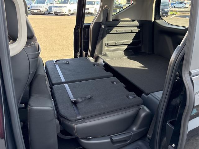 フリード＋ハイブリッド ハイブリッド・クロスター　ホンダセンシング　レーダークルーズ　レーンキープ　純正９インチナビＴＶＢカメラ　Ｂｌｕｔｏｏｔｈ　前後ドラレコ　ルーフレール　シートヒーター　ＬＥＤオートライト　ＥＴＣ　ＵＳＢ　両側ＰＷスライド（25枚目）