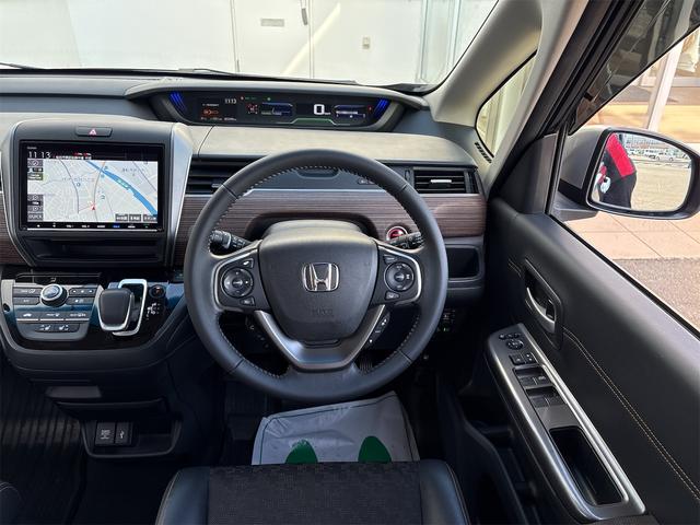 フリード＋ハイブリッド ハイブリッド・クロスター　ホンダセンシング　レーダークルーズ　レーンキープ　純正９インチナビＴＶＢカメラ　Ｂｌｕｔｏｏｔｈ　前後ドラレコ　ルーフレール　シートヒーター　ＬＥＤオートライト　ＥＴＣ　ＵＳＢ　両側ＰＷスライド（28枚目）