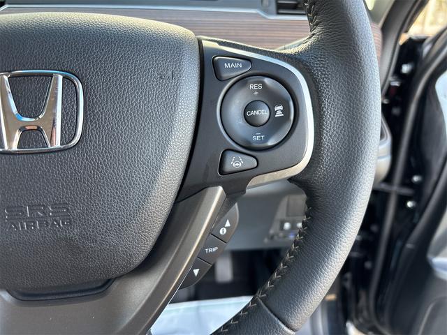 フリード＋ハイブリッド ハイブリッド・クロスター　ホンダセンシング　レーダークルーズ　レーンキープ　純正９インチナビＴＶＢカメラ　Ｂｌｕｔｏｏｔｈ　前後ドラレコ　ルーフレール　シートヒーター　ＬＥＤオートライト　ＥＴＣ　ＵＳＢ　両側ＰＷスライド（34枚目）