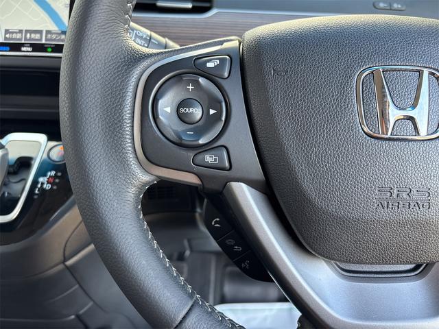 フリード＋ハイブリッド ハイブリッド・クロスター　ホンダセンシング　レーダークルーズ　レーンキープ　純正９インチナビＴＶＢカメラ　Ｂｌｕｔｏｏｔｈ　前後ドラレコ　ルーフレール　シートヒーター　ＬＥＤオートライト　ＥＴＣ　ＵＳＢ　両側ＰＷスライド（35枚目）