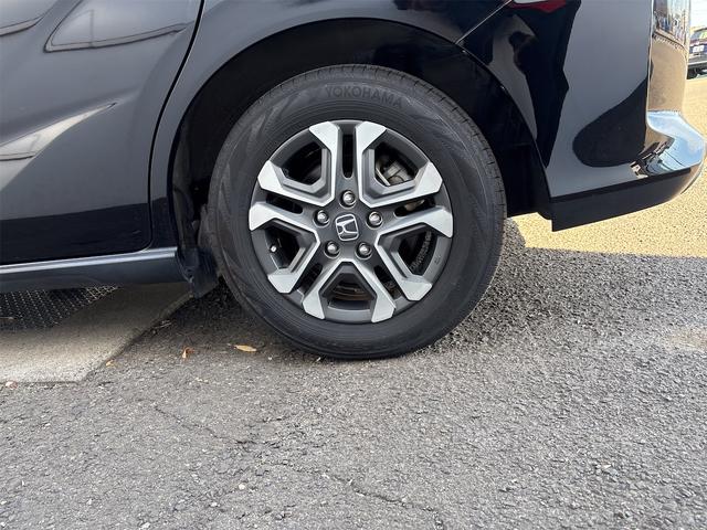 フリード＋ハイブリッド ハイブリッド・クロスター　ホンダセンシング　レーダークルーズ　レーンキープ　純正９インチナビＴＶＢカメラ　Ｂｌｕｔｏｏｔｈ　前後ドラレコ　ルーフレール　シートヒーター　ＬＥＤオートライト　ＥＴＣ　ＵＳＢ　両側ＰＷスライド（66枚目）