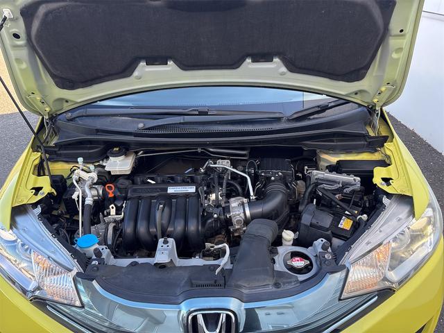 フィットハイブリッド Ｌパッケージ　衝突軽減装置　ナビＴＶＢカメラ　Ｂｌｕｔｏｏｔｈ　ＬＥＤオートライト　　ドラレコ　ＬＥＤオートライト　スマートキー２個　ＥＴＣ　ＵＳＢ　ハーフレザーシート　クルーズコントロール　サイドエアバック（65枚目）