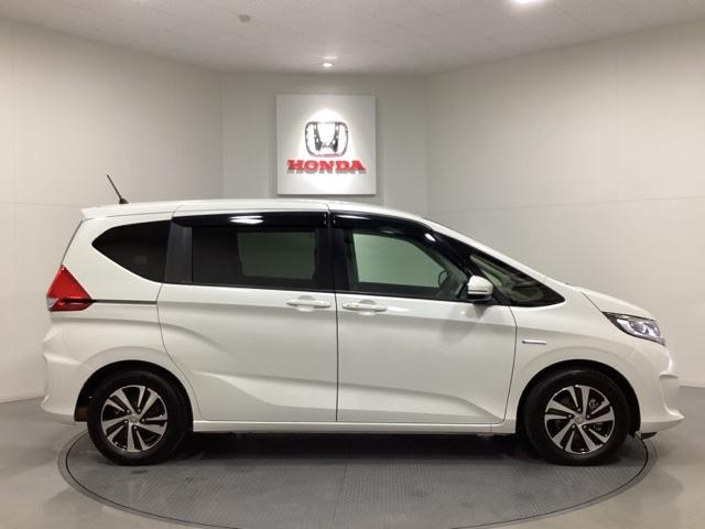 フリードハイブリッド ハイブリッド・Ｇホンダセンシング　７人乗り　ドライブレコーダー　両側電動スライドドア　純正ナビ　バックカメラ　Ｂｌｕｅｔｏｏｔｈ接続　ＬＥＤヘッドライト　ＥＴＣ　純正アルミホイール　ホンダセンシング　スマートキー　フルセグ　ＤＶＤ（5枚目）