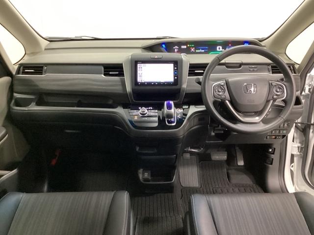 フリードハイブリッド ハイブリッド・Ｇホンダセンシング　７人乗り　ドライブレコーダー　両側電動スライドドア　純正ナビ　バックカメラ　Ｂｌｕｅｔｏｏｔｈ接続　ＬＥＤヘッドライト　ＥＴＣ　純正アルミホイール　ホンダセンシング　スマートキー　フルセグ　ＤＶＤ（6枚目）