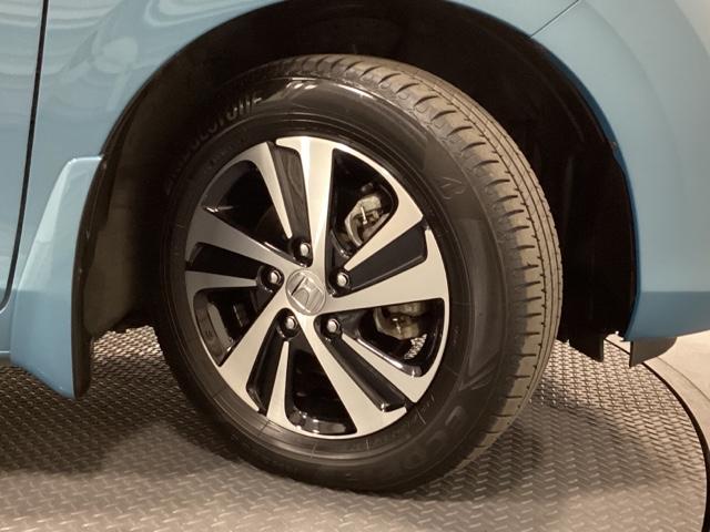 フリードハイブリッド ハイブリッド・Ｇホンダセンシング　２オーナー　６人乗り　純正エンジンスターター　メモリーナビ　フルセグ　Ｂｌｕｅｔｏｏｔｈバックカメラ　ＥＴＣリア席モニター　両側電動スライドドア　シートヒーター　オートライト機能付ＬＥＤヘッド　記録簿（29枚目）