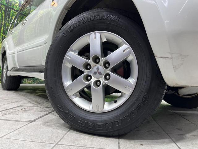 アクティブフィールドエディション 4WD 純正HDDナビ 後席フリップダウンモニター バックカメラ ハーフレザーシート パワーシート 前席シートヒーター HIDヘッド オートライト 寒冷地仕様(52枚目)