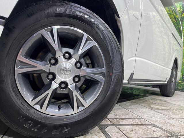 ハイエースバン スーパーＧＬ　ダークプライムＩＩ　４ＷＤ　ベッドキット　純正ナビ　フリップダウンモニター　両側電動スライドドア　デジタルインナーミラー　セーフティセンス　純正オプション１５インチアルミ　バックカメラ　ドラレコ　ＥＴＣ　禁煙車（15枚目）