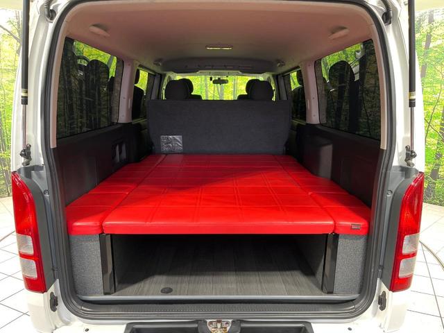 ハイエースバン ロングスーパーGL 4WD ベッドキット ターボ 純正ナビ バックカメラ 100V電源 禁煙車 ドラレコ ETC オートライト デュアルオートエアコン 純正15AW Bluetooth再生 DVD再生 フォグライト(3枚目)