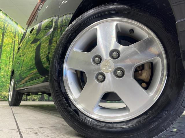 トッポ T 4WD インタークーラーターボチャージャー 禁煙車 シートヒーター HIDヘッド CDオーディオ キーレスエントリー 電動格納ミラー 純正14インチアルミホイール ベンチシート(30枚目)