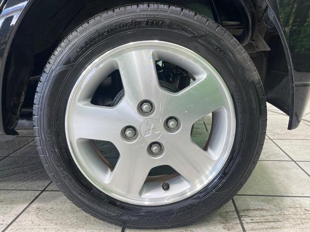 トッポ T 4WD インタークーラーターボチャージャー 禁煙車 シートヒーター HIDヘッド CDオーディオ キーレスエントリー 電動格納ミラー 純正14インチアルミホイール ベンチシート(33枚目)