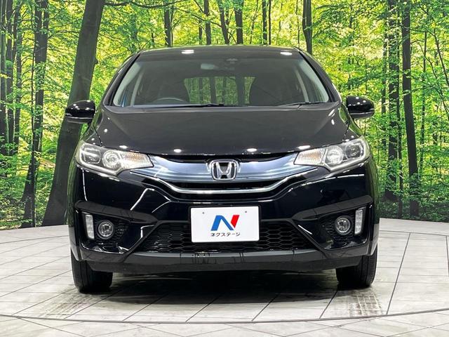 フィット １３Ｇ・Ｓパッケージ　４ＷＤ　禁煙車　純正ナビ　バックカメラ　衝突軽減装置　ＥＴＣ　ＬＥＤヘッド　オートライト　純正１５インチアルミ　オートエアコン　ステアリングスイッチ　Ｂｌｕｅｔｏｏｔｈ再生　電動格納ミラー（15枚目）