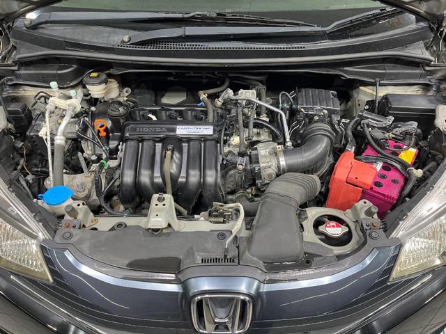 フィット １３Ｇ・Ｓパッケージ　４ＷＤ　禁煙車　純正ナビ　バックカメラ　衝突軽減装置　ＥＴＣ　ＬＥＤヘッド　オートライト　純正１５インチアルミ　オートエアコン　ステアリングスイッチ　Ｂｌｕｅｔｏｏｔｈ再生　電動格納ミラー（19枚目）