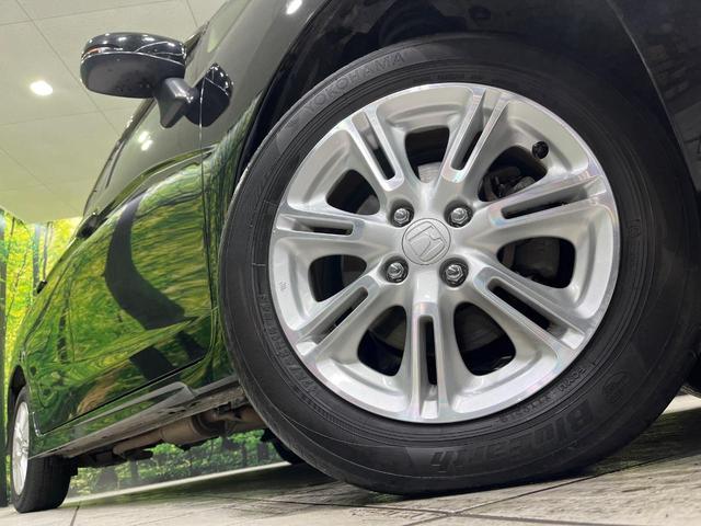 フィット １３Ｇ・Ｓパッケージ　４ＷＤ　禁煙車　純正ナビ　バックカメラ　衝突軽減装置　ＥＴＣ　ＬＥＤヘッド　オートライト　純正１５インチアルミ　オートエアコン　ステアリングスイッチ　Ｂｌｕｅｔｏｏｔｈ再生　電動格納ミラー（56枚目）