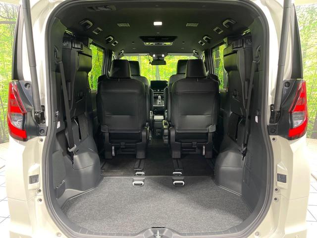 ノア ハイブリッドＳ－Ｚ　４ＷＤ　純正１０．５インチナビ　フリップダウンモニター　全方位カメラ　両側電動スライド　パワーバックドア　シートヒーター　ステアリングヒーター　プロジェクター式ＬＥＤヘッド　ドラレコ　ＥＴＣ　禁煙車（13枚目）