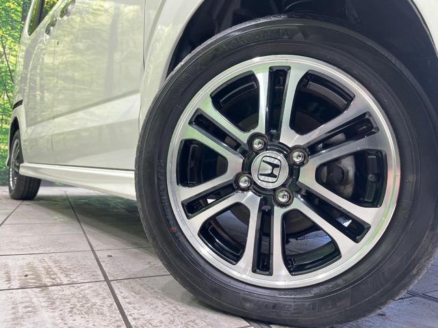 Ｎ－ＢＯＸカスタム Ｇ　ＳＳパッケージ　４ＷＤ　禁煙車　ＳＤナビ　後席モニター　両側電動スライドドア　スマートキー　ＨＩＤヘッド　オートライト　ステアリングスイッチ　オートエアコン　横滑り防止装置（14枚目）