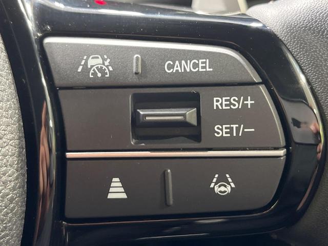 Ｎ－ＢＯＸカスタム ターボ　４ＷＤ　純正９インチナビ　バックカメラ　両側電動スライドドア　ホンダセンシング　アダプティブクルーズ　ＬＥＤヘッド　オートハイビーム　スマートキー　レーンアシスト　シートヒーター　禁煙車（7枚目）