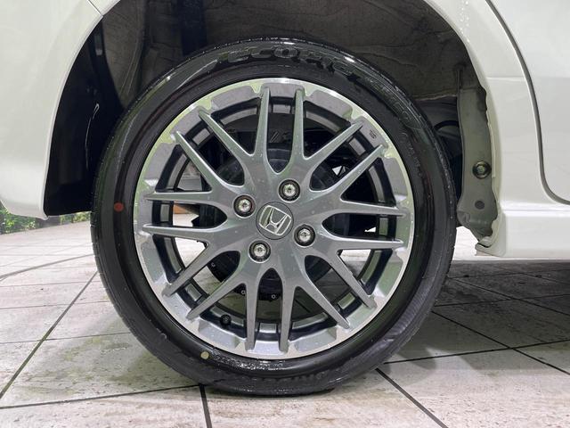 N-BOXカスタム ターボ 4WD 純正9インチナビ バックカメラ 両側電動スライドドア ホンダセンシング アダプティブクルーズ LEDヘッド オートハイビーム スマートキー レーンアシスト シートヒーター 禁煙車(64枚目)