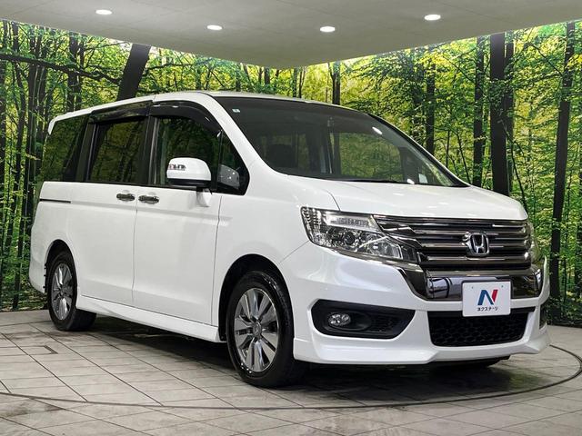 ステップワゴンスパーダ Ｚ　クールスピリット　４ＷＤ　純正９型ナビ　両側電動ドア　後席モニター　バックカメラ　寒冷地仕様　禁煙車　ハーフレザーシート　ドラレコ　スマートキー　ＨＩＤヘッド　ビルトインＥＴＣ　クルコン　純正１６インチアルミ（17枚目）