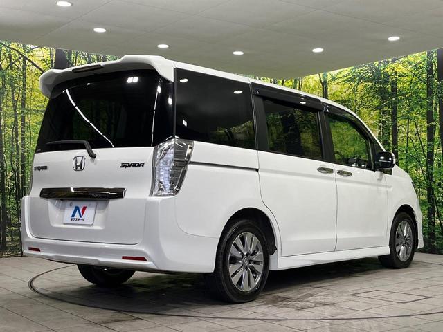 ステップワゴンスパーダ Ｚ　クールスピリット　４ＷＤ　純正９型ナビ　両側電動ドア　後席モニター　バックカメラ　寒冷地仕様　禁煙車　ハーフレザーシート　ドラレコ　スマートキー　ＨＩＤヘッド　ビルトインＥＴＣ　クルコン　純正１６インチアルミ（18枚目）