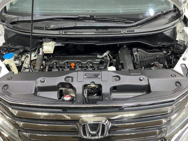 ステップワゴンスパーダ Ｚ　クールスピリット　４ＷＤ　純正９型ナビ　両側電動ドア　後席モニター　バックカメラ　寒冷地仕様　禁煙車　ハーフレザーシート　ドラレコ　スマートキー　ＨＩＤヘッド　ビルトインＥＴＣ　クルコン　純正１６インチアルミ（19枚目）