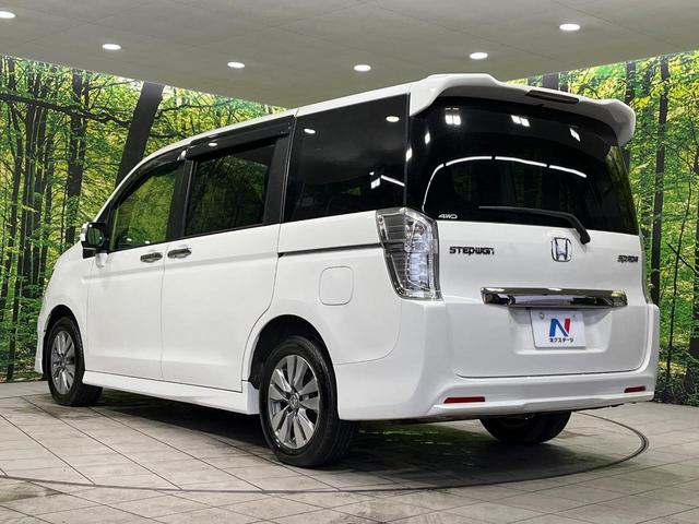 ステップワゴンスパーダ Ｚ　クールスピリット　４ＷＤ　純正９型ナビ　両側電動ドア　後席モニター　バックカメラ　寒冷地仕様　禁煙車　ハーフレザーシート　ドラレコ　スマートキー　ＨＩＤヘッド　ビルトインＥＴＣ　クルコン　純正１６インチアルミ（28枚目）