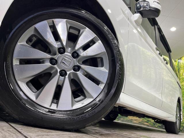 ステップワゴンスパーダ Ｚ　クールスピリット　４ＷＤ　純正９型ナビ　両側電動ドア　後席モニター　バックカメラ　寒冷地仕様　禁煙車　ハーフレザーシート　ドラレコ　スマートキー　ＨＩＤヘッド　ビルトインＥＴＣ　クルコン　純正１６インチアルミ（63枚目）